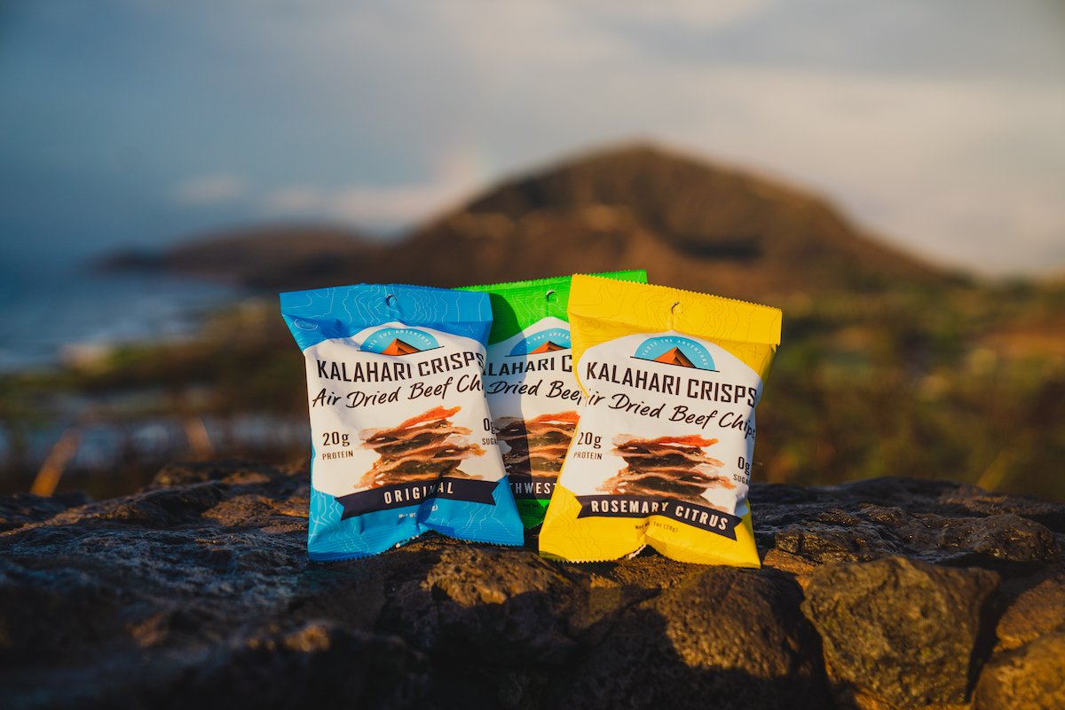 Variety pack of Kalahari Crisps on volcanic rock